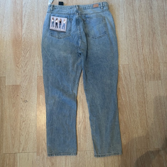 Light Washed Ripped Jeans - Picture 2 of 4